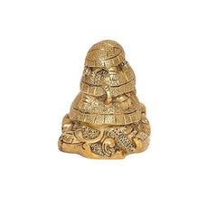 Brass turtle figurine from back/side with textured shell, 3-inch height