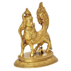 Brass Kamadhenu cow with wings idol, three-quarter view showing legs and tail