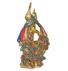 Brass peacock showpiece in gold with blue red green jeweled fan-like wings