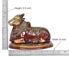 Nandi bull statue size: 6.5 in height, 8 in width, gold head on red body