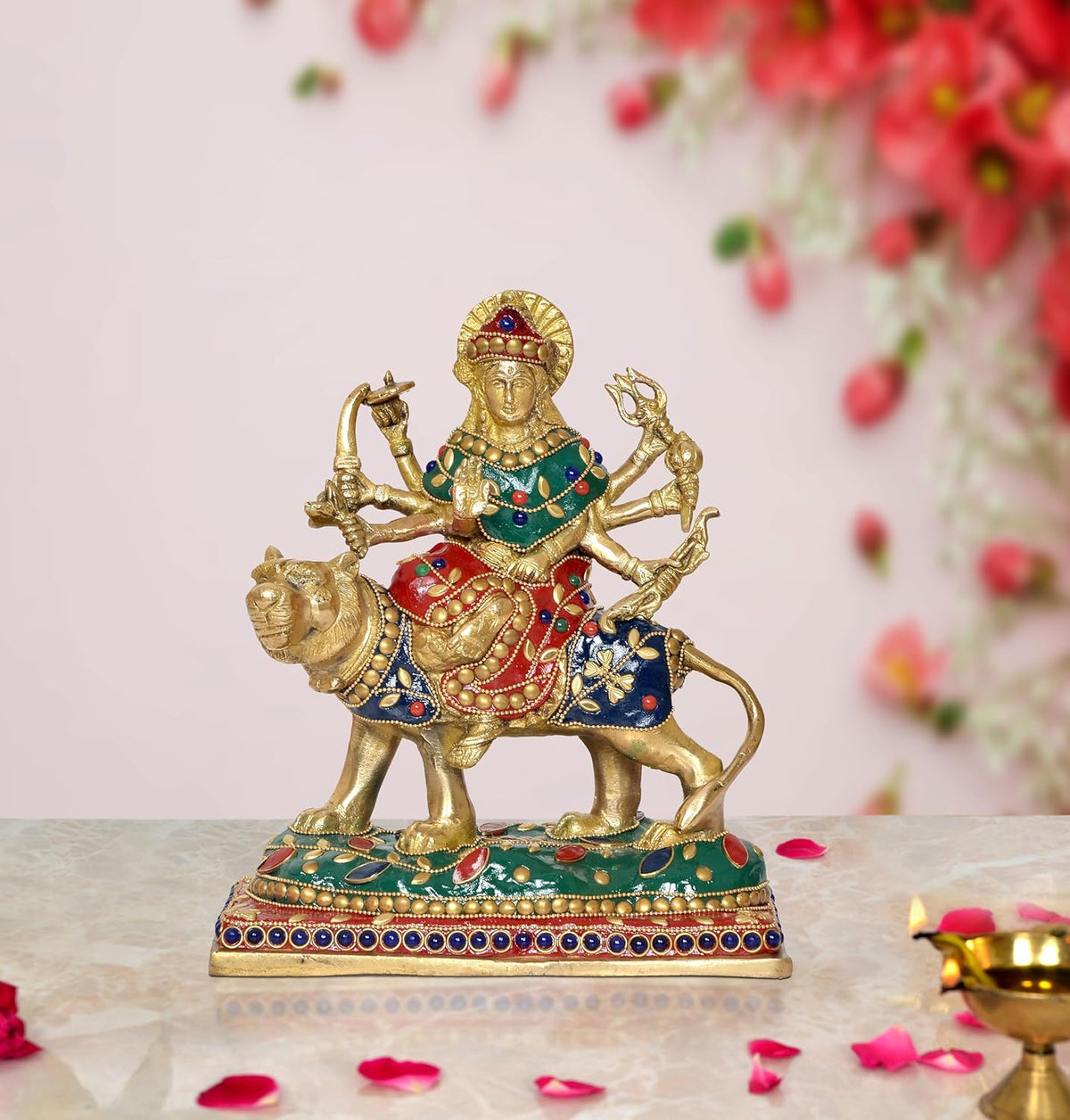 Brass Durga Maa statue riding lion, gold deity with colorful enamel detailing