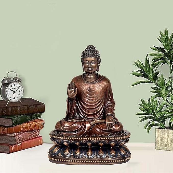 Resin Buddha idol sculpture, seated with hands in lap, dark blue-gold base