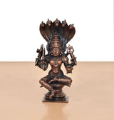 Seated copper goddess idol with raised arms, detailed cobra-hood canopy, 5 inch