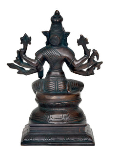 Varahi Vishnu idol figurine, back view with seated posture and detailed circular torso carving
