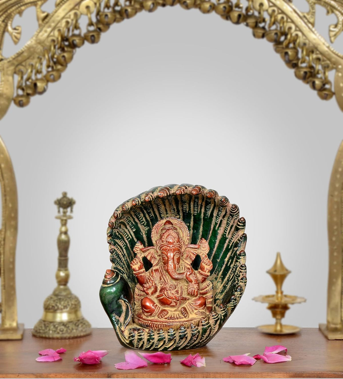 Green shankh shell Ganesha showpiece with painted Lord Ganesha figure, front view