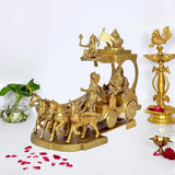 Brass Arujana Rath statue on round base with chariot, horses, and attendant figures.