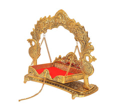 Gold metal Laddu Gopal swing cradle side view with red bed, detailed arch and chains