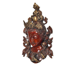 Tara wall hanging mask statue, side view with gold headpiece and red face details