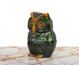 Three-quarter view brass owl decor, green dark body with golden eye details