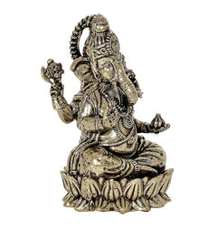 Brass Lord Ganpati murti angled view, decorative torso and jewelry, seated on lotus