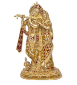 Brass Radha Krishna idol with peacock-playing-flute motif, multicolor robes and jewelry