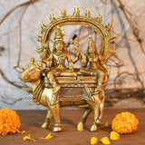 Brass Shiva Parvati idol on Nandi, close view of seated figures and halo
