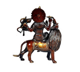 Maa Durga brass figure with lion, rear view, holding offering bowl and trident