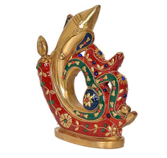 Brass Ganesha figurine with gold trunk and red-green jeweled pattern, raised base