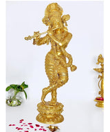 Brass Krishna figurine playing flute, ornate standing pose with round base