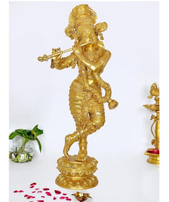 Brass Krishna figurine playing flute, ornate standing pose with round base