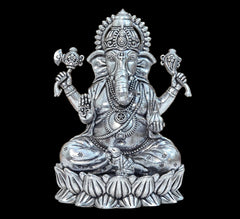 Brass Lord Ganesha idol, seated on lotus with four arms, detailed engravings