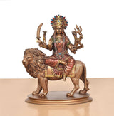 Durga Maa resin idol riding lion, jeweled crown and colorful garments on base
