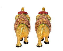 Rear view of two gold elephant idol figurines, red crown detail, patterned body, 3-inch
