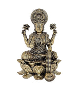 Brass Lakshmi statue idol seated on lotus, ornate crown and four arms