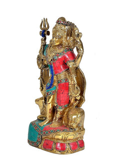 Brass Ardhanarishvara statue, side angle, ornate face, red and teal panels