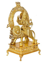 Brass Durga statue idol rear three-quarter view on decorative pedestal