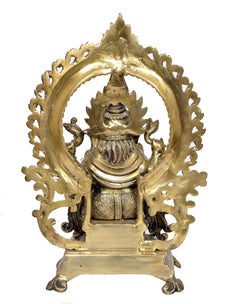 Natural brass Ganesha idol on throne, back view with detailed halo