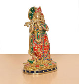 Radha-Krishna Idol aus Messing, vorderseitige Ansicht, rotes Gewand mit bunten Mustern