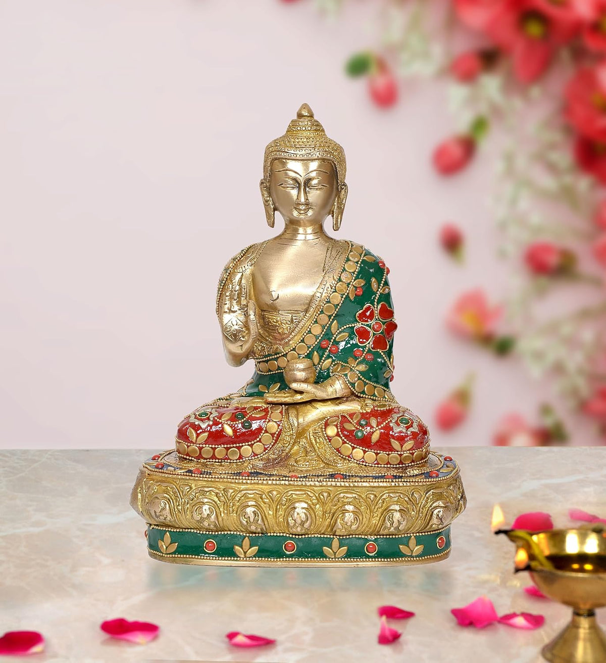 Brass Buddha statue, seated idol with green-and-red jeweled robe and ornate base