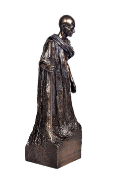 Gandhi standing resin figurine, side view showing draped shawl and base text