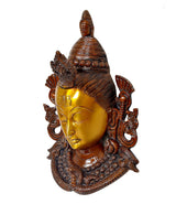 Shiva wall hanging mask idol side view, golden face with dark carved halo and arms