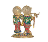 Brass Radha-Krishna idol rear view: peacock-feather halos, Krishna flute; colorful motifs
