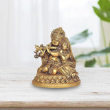 Brass Radha-Krishna sitting on an ornate asan, holding a chain garland, 4-inch statue