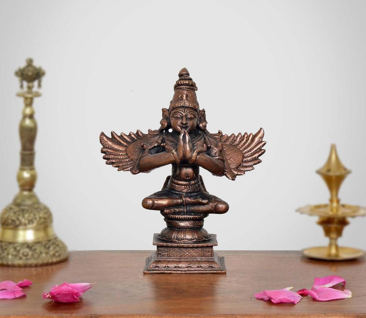 Copper Garun Bhagwan idol, 5 inch, seated figure with wings and joined hands
