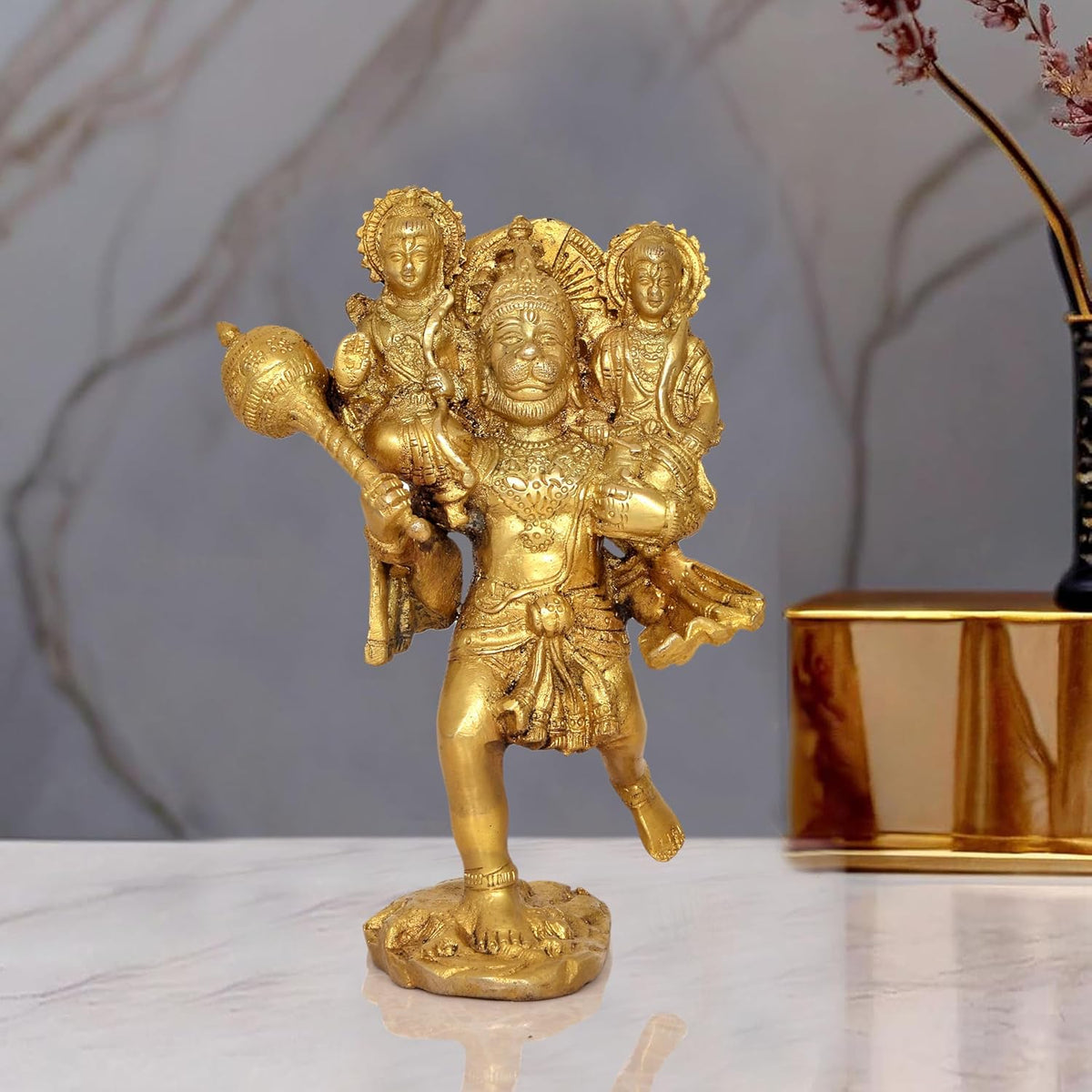 Brass Hanuman sculpture holding Ram ji and Lakshman, front view