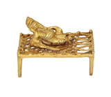 Brass Ganesha on woven charpai cot statue, front view, small temple decor