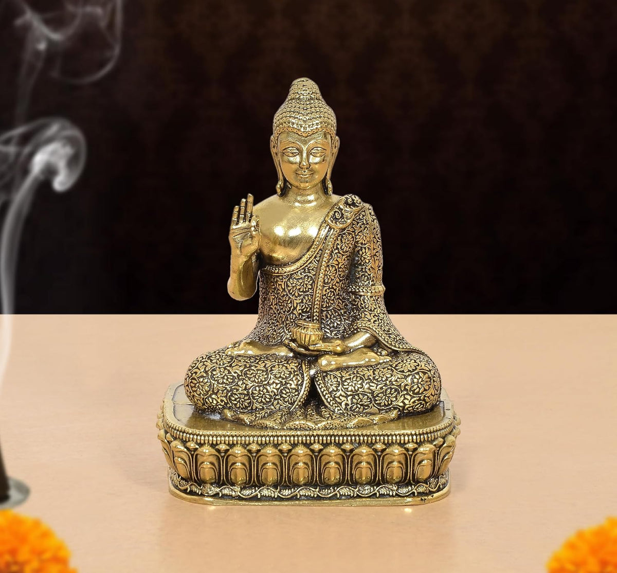 Bronze Buddha idol seated in Abhaya mudra, gold-toned, front view, 4 inch height