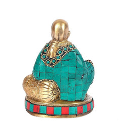 Brass Sai Baba statue rear view, teal inlay robe with beaded collar and striped base