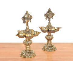 Brass five-diya shankh oil lamp stand with chakra medallion and five diya cups