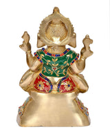 Rear view of brass Ganesh idol with green robe and multicolor enamel details