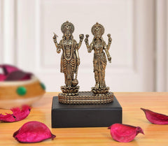 Brass standing Maa Lakshmi and Vishnu idol on engraved base