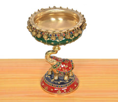 Brass elephant urli idol with empty gold bowl, painted base and jeweled details