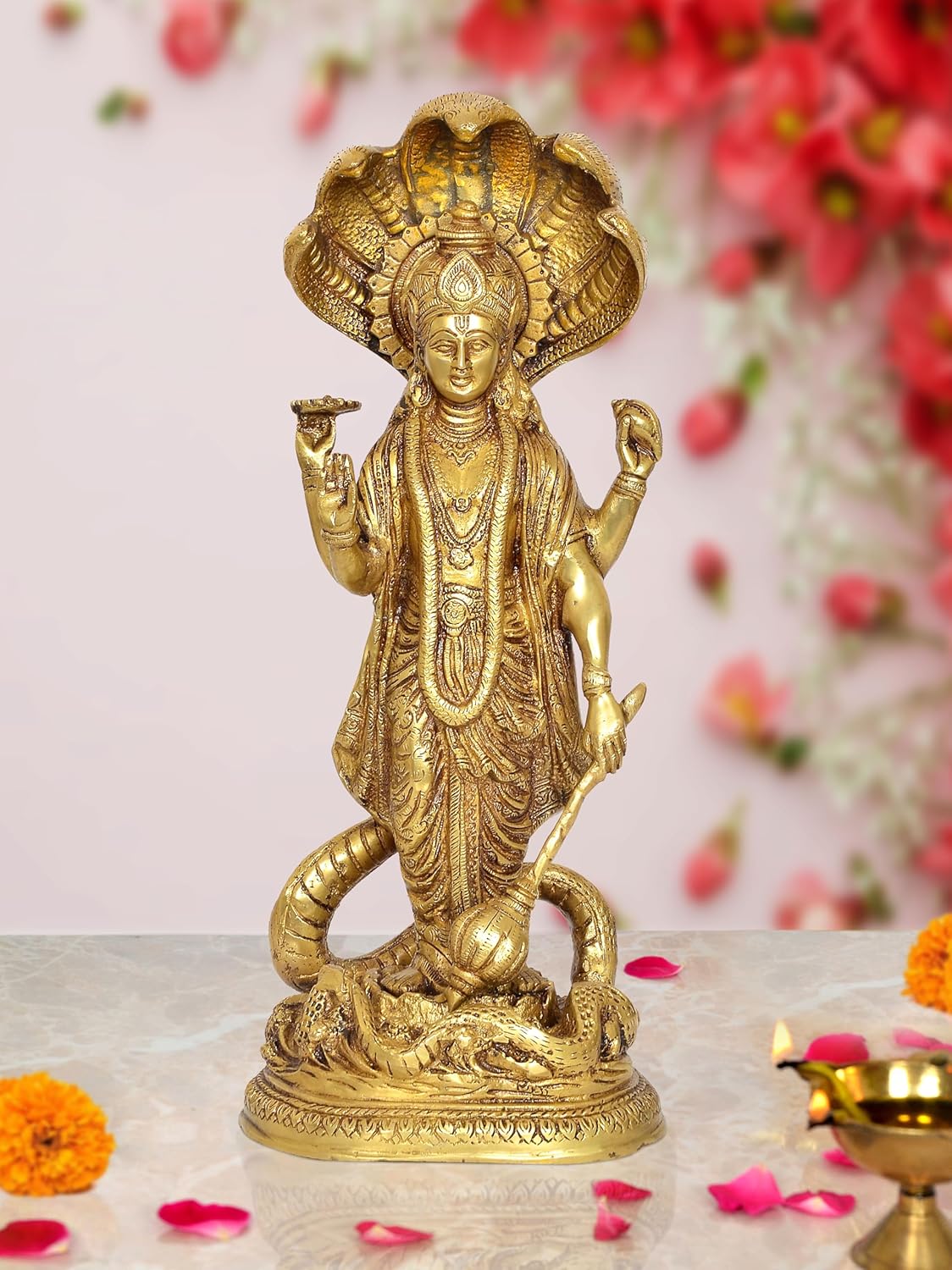 Gold-toned brass Vishnu standing idol with Sheshanaag serpent at base