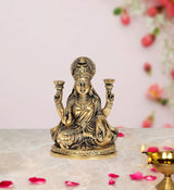 Brass Lakshmi Laxmi idol statue with four arms, seated on lotus base