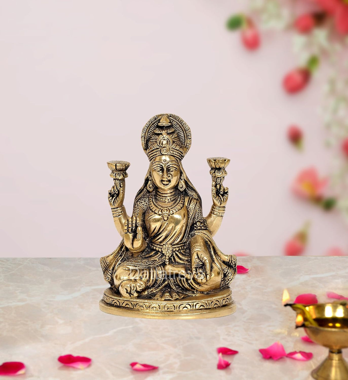 Brass Lakshmi Laxmi idol statue with four arms, seated on lotus base