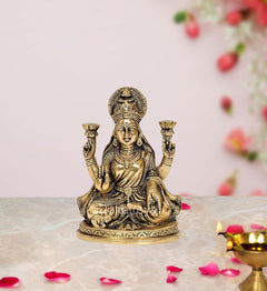 Brass Lakshmi Laxmi idol statue with four arms, seated on lotus base