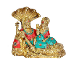 Brass Vishnu and Lakshmi idol on Shesha Naga with raised hands and jeweled crowns
