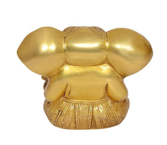 Brass Ganesha idol statue, rear view with textured dhoti pattern