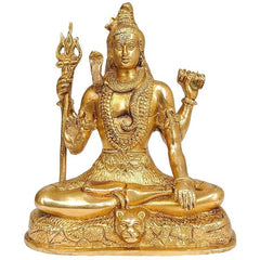 Brass seated Shiva figurine, 7.5 in, four-armed with trident and raised hands