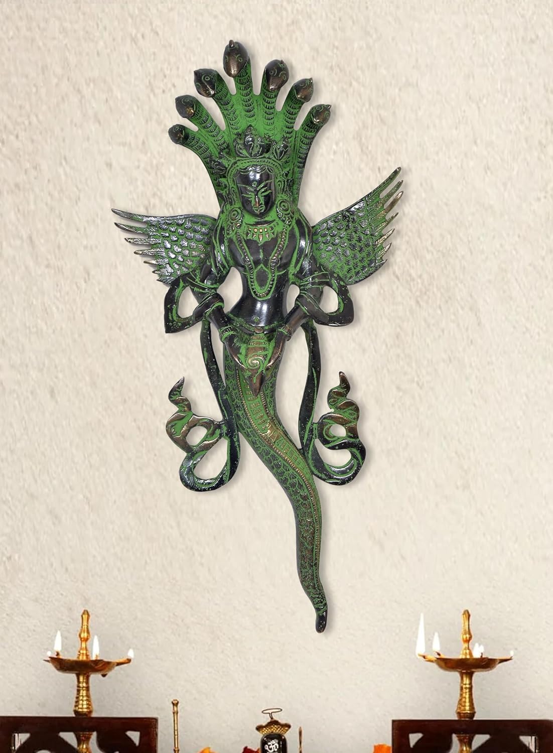 Green brass Naga Kanya statue with multi-hood cobra head and detailed winged arms